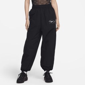Nike Sportswear geweven joggingbroek voor dames - Groen