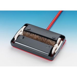 Tapijtveger in rood