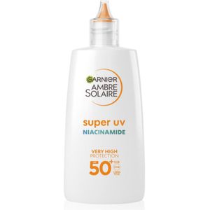 Garnier Ambre Solaire Super UV ultralichte beschermende fluid tegen Oneffenheden SPF 50+ 40 ml