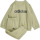 Adidas badge of sports joggingpak in de kleur groen.