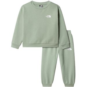 The north face simple dome fleece set in de kleur groen.