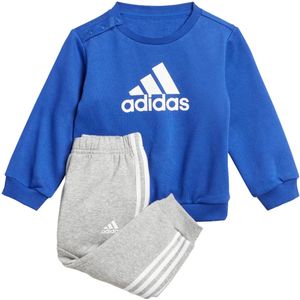 Adidas badge of sport french terry joggingpak in de kleur blauw.
