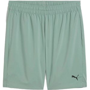 Puma tad essentials 7 woven short in de kleur groen.