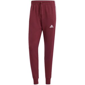 Adidas essentials french terry tapered joggingbroek in de kleur rood.