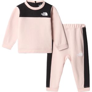 The north face tweedelige tnf tech-set in de kleur roze.