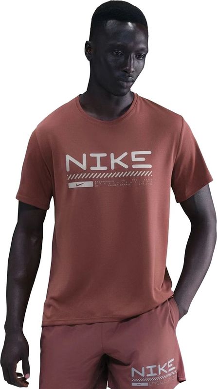 Nike miler winterized sh in de kleur bruin.