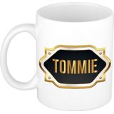 Naam cadeau mok / beker Tommie met gouden embleem 300 ml