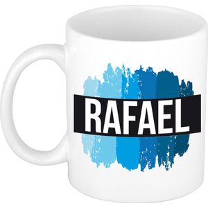 Naam cadeau mok / beker Rafael met blauwe verfstrepen 300 ml