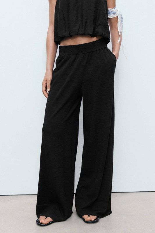 Mango wide leg regular waist broek zwart fijn gebreid