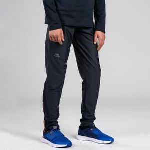 Warme atletiekbroek voor kinderen grijs/fluo-oranje