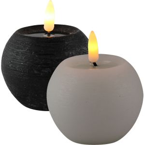 LED kaarsen/bolkaarsen - 2x st - rond - zwart en wit - D8 x H7,5 cm - LED kaarsen