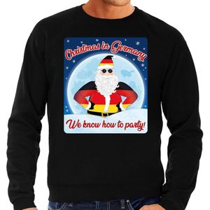 Zwarte foute Duitsland kersttrui / sweater Christmas in Germany we know how to party voor heren - kerst truien
