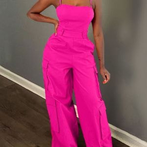 Vrouwen roze casual lente/zomer spaghetti-strap jumpsuit met zakken, eendimensionale kleur brede benen cargo overalls voor volwassenen