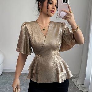 Double-breasted metal-kleurige stof met puffmouwen en taille, elegante dameshemd