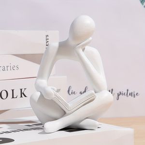1pc Abstract Figure Reading Book With Ornament