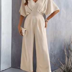 Stijlvol zwart jumpsuit met V-hals voor dames - Casual zomermuts met gedrapeerde design, lichtgewicht polyester, perfect voor volwassen mode, casual kleding | V-hals jumpsuit | Polyester