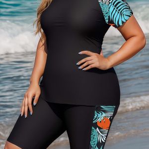 OUDASI Dames Plus Size Tankini Badpak - Hoge Taille, Buikcontrole, Bloemenprint, Rekbare Stof, Elegant Ontwerp met Zijstreepdetail, Zwart & Blauw Tropisch Bladpatroon, Hoge Taille Badpak