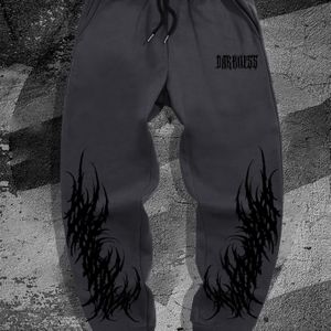Nieuwe gotische donkere stijl heren casual joggers voor lente op campus.