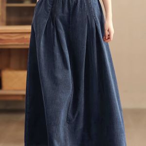Vrouwelijke elegante polyester ribfluwelen rok met zakken - Casual effenkleurige uitlopende midi rok met elastische taille voor lente/herfst