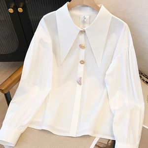 Elegante, puntige kraag, stijlvolle, enkele rij knopen, losse kraagloze mouwshirt, top voor dames