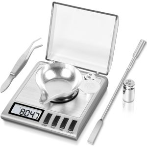 Een elektronische weegschaal van hoge precisie voor thuisgebruik, in staat om 0.001G te meten, draagbaar en compact, geschikt voor het van goud en medicijnen.