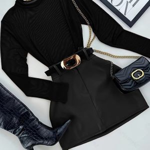 Modieuze veelzijdige semi-transparante mesh pullover lange mouwen T-shirt en heupomwikkelende korte rok set, riem niet inbegrepen