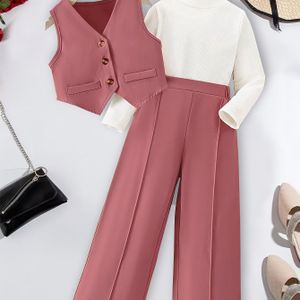 Hoogwaardige meisjes set in kleur, bestaande uit een witte vest met ronde hals, lange mouwen en een rechte broek. Ideaal voor de herfst en winter, perfect voor buiten.