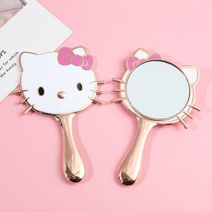 Cartoon schattige Hello Kitty draagbare make-upspiegel met hartvormig handvat, geschikt als kerstcadeau voor meisjes