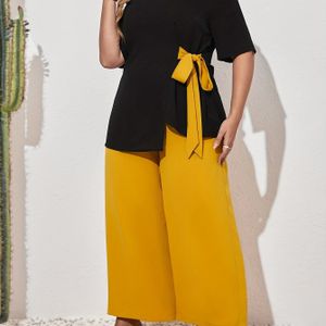 Plus Size Damesmode Outfit - Elegante Zwarte Top met Strik Detail, Wijde Pijpen, Polyester, Niet-Rekbaar, Kleur, Perfect voor Lente/Zomer/Herfst, Casual Kleding|Strik Detail Top|Polyester Stof