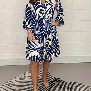 Vrouwen A-lijn jurk van polyestermix met geometrische print, V-hals, spandex voor stretch, machinewasbaar, geschikt voor alle seizoenen.