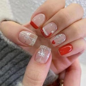 Vier Kerstmis met 24 elegante opdruknagels, korte vierkante kunstnagels met zilveren glinsterende strikken ontwerpen