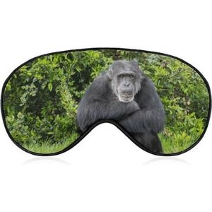 Chimpansee zit en wacht geduldig om te worden gevoed slaapmasker met verstelbare riem, comfortabel zacht oogmasker, slaaphulp, lichtblokkerende oogmaskers