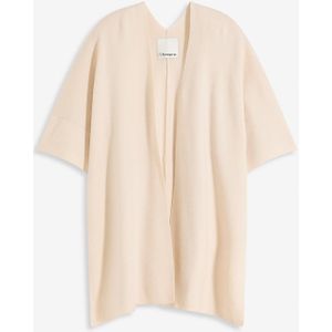 Oversized gebreide cape