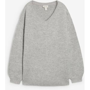 Fijngebreide trui met ballonmouwen