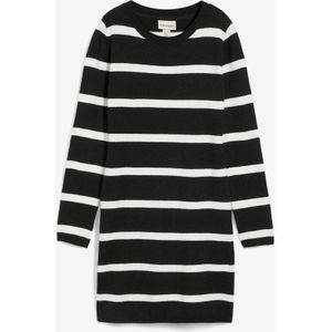 Accentuerende gebreide jurk