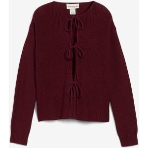 Vest met strikdetails