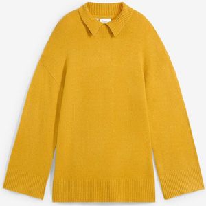 Oversized trui met col en zijsplitten