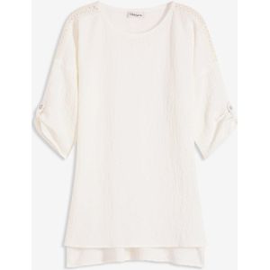 Tuniek met structuur en kanten band