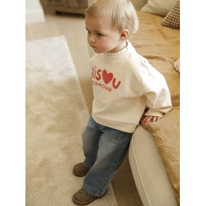 Babyset met sweater en wijde jeans vanille