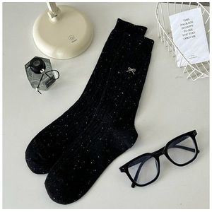 Leuke sokken met strikje geborduurd