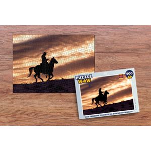 Puzzel Een eenzame cowboy bij zonsondergang - Legpuzzel - Puzzel 500 stukjes