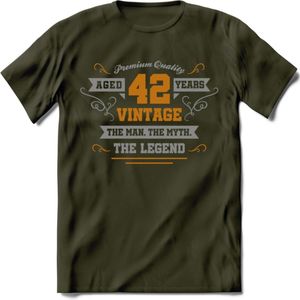 42 Jaar Legend T-Shirt | Goud - Zilver | Grappig Verjaardag Cadeau | Dames - Heren | - Leger Groen - XXL
