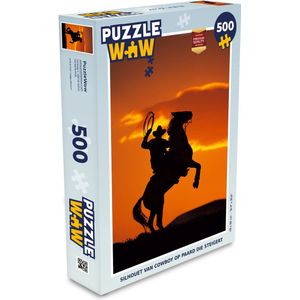 Puzzel Silhouet van cowboy op paard die steigert - Legpuzzel - Puzzel 500 stukjes