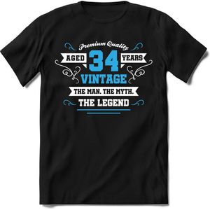 34 Jaar Legend - Feest kado T-Shirt Heren / Dames - Wit / Blauw - Perfect Verjaardag Cadeau Shirt - grappige Spreuken, Zinnen en Teksten. Maat S