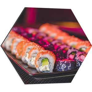 Dibond Hexagon - Schaal Vol met Verschillende Smaken Sushi in Paars Licht - 50x43.5 cm Foto op Hexagon (Met Ophangsysteem)