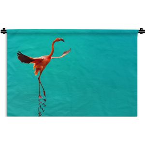 Wandkleed Flamingo  - Flamingo in de blauwe zee Wandkleed katoen 180x120 cm - Wandtapijt met foto XXL / Groot formaat!