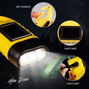 Mrs. Jones Zaklamp handslinger op zonne-energie oplaadbare led noodgevallen dynamo zaklamp met clip voor camping outdoor klimrugzak wandelen - geel met 2 stuks .