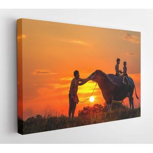 Silhouette children riding on a buffalo with father in sunset - Modern Art Canvas - Horizontal - 369723320 - 115*75 Horizontal