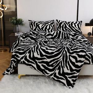 Winterfleece pluizig beddengoed 135 x 200 cm kasjmier touch pluche warm luipaardprint beddengoed dekbedovertrek zwart wit luipaardmotief pluizig fleece winterbeddengoedset met kussensloop 80 x 80 cm