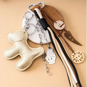 Sleutelhangers en Tassenhangers - shop